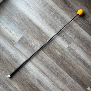The Orange Whip golf swing trainer